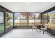 Screened porch with outdoor seating and views of the backyard at 6543 Barcelona Blvd, Brooksville, FL 34602