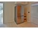 Stainless steel refrigerator in a kitchen with light wood flooring at 6699 78Th N Ave, Pinellas Park, FL 33781