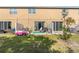 Private backyard patio with grassy area at 6944 Towne Lake Rd, Riverview, FL 33578