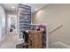 Upper hallway with built-in desk and access to bedrooms at 6944 Towne Lake Rd, Riverview, FL 33578