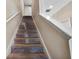 Staircase leading to the upper level of the home at 6944 Towne Lake Rd, Riverview, FL 33578