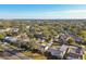 Neighborhood wide aerial view showing nearby homes and landscape at 718 40Th Ne Ave, St Petersburg, FL 33703