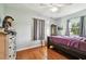 Cozy bedroom with hardwood floors and ample closet space at 718 40Th Ne Ave, St Petersburg, FL 33703