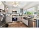 Modern kitchen with stainless steel appliances and ample counter space at 718 40Th Ne Ave, St Petersburg, FL 33703