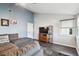 Spacious living room with gray sectional sofa and ceiling fan at 718 40Th Ne Ave, St Petersburg, FL 33703