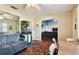 Open living room with view into adjacent room and lots of natural light at 718 40Th Ne Ave, St Petersburg, FL 33703