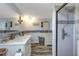 Modern bathroom with a walk-in shower and updated vanity at 7643 Vienna Ln, Port Richey, FL 34668
