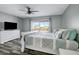 Serene bedroom with a king-size bed and pool view at 7643 Vienna Ln, Port Richey, FL 34668