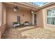 Inviting front porch with hanging plants and seating at 7643 Vienna Ln, Port Richey, FL 34668