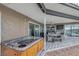 Relaxing hot tub on patio with lake view at 7643 Vienna Ln, Port Richey, FL 34668