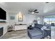 Spacious living room with comfortable sectional sofa and water view at 7643 Vienna Ln, Port Richey, FL 34668