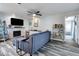 Living room boasts a fireplace and plenty of natural light at 7643 Vienna Ln, Port Richey, FL 34668