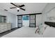 Spacious bedroom with a king-size bed and water views at 7643 Vienna Ln, Port Richey, FL 34668