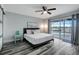 Main bedroom with water views and sliding glass doors to the pool at 7643 Vienna Ln, Port Richey, FL 34668