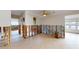 Dining room undergoing renovation with exposed framing and tiled floors at 7824 3Rd S Ave, St Petersburg, FL 33707