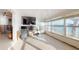 Bright sunroom with water views and large windows, currently under renovation at 7824 3Rd S Ave, St Petersburg, FL 33707