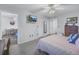 Bedroom with a queen bed and access to a smaller dining area at 8174 Terrace Garden N Dr # 110, St Petersburg, FL 33709