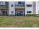 Exterior view of condo building and patio at 8174 Terrace Garden N Dr # 110, St Petersburg, FL 33709