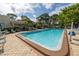Refreshing community pool with ample deck space for lounging at 8174 Terrace Garden N Dr # 110, St Petersburg, FL 33709