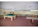 Community recreation room with billiard tables and other games at 8174 Terrace Garden N Dr # 110, St Petersburg, FL 33709