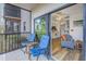 Screened balcony with view of the living area at 8174 Terrace Garden N Dr # 110, St Petersburg, FL 33709