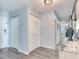 Light and airy entryway with built-in storage and mirror at 855 Bayway Blvd # 606, Clearwater, FL 33767