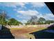 Large backyard with grassy area and wooden fence at 8577 79Th Ave, Seminole, FL 33777