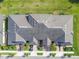 Community overview showing building rooftops and landscaping at 10374 Echo Dock Loop, San Antonio, FL 33576