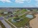 Community entrance with unique fountain and landscaping at 10374 Echo Dock Loop, San Antonio, FL 33576