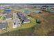 Aerial view of houses near a lake and conservation area at 10374 Echo Dock Loop, San Antonio, FL 33576