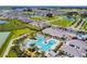 Aerial view of community pool and surrounding homes at 10374 Echo Dock Loop, San Antonio, FL 33576