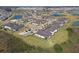 Aerial view showing houses in a neighborhood near conservation at 10374 Echo Dock Loop, San Antonio, FL 33576