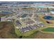 Community overview from above, showing homes, landscaping, and lakes at 10374 Echo Dock Loop, San Antonio, FL 33576