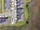 Aerial view of the community, highlighting building placement and green spaces at 10374 Echo Dock Loop, San Antonio, FL 33576