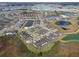Drone view of community neighborhood and surrounding landscape at 10374 Echo Dock Loop, San Antonio, FL 33576