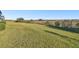 Large grassy backyard with a sprawling view at 10374 Echo Dock Loop, San Antonio, FL 33576