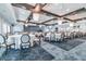 Grand banquet hall with elegant round tables and chairs at 10374 Echo Dock Loop, San Antonio, FL 33576