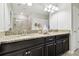 Elegant bathroom with granite countertops and double sinks at 10374 Echo Dock Loop, San Antonio, FL 33576