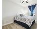 Bedroom with carpeted floor, double bed, and ceiling fan at 10374 Echo Dock Loop, San Antonio, FL 33576