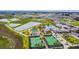 Aerial view of community amenities including tennis courts, pickleball, and pool at 10374 Echo Dock Loop, San Antonio, FL 33576