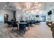 Bright community room with ample seating and stylish light fixtures at 10374 Echo Dock Loop, San Antonio, FL 33576