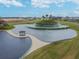Community entrance features a large fountain and landscaping at 10374 Echo Dock Loop, San Antonio, FL 33576