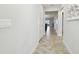 View down hallway into living area from entry at 10374 Echo Dock Loop, San Antonio, FL 33576