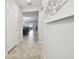 View down hallway into living area from entry at 10374 Echo Dock Loop, San Antonio, FL 33576