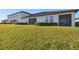 Row of houses with green lawn in front at 10374 Echo Dock Loop, San Antonio, FL 33576