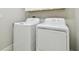 Convenient laundry room with washer and dryer at 10374 Echo Dock Loop, San Antonio, FL 33576