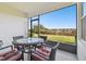Relaxing screened patio with outdoor seating at 10374 Echo Dock Loop, San Antonio, FL 33576