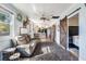Open living area with a view into the kitchen and bedroom at 14045 21St St, Dade City, FL 33525