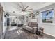 Spacious living room featuring a cozy couch and farmhouse decor at 14045 21St St, Dade City, FL 33525