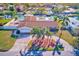 Single Gathering home with circular driveway and canal access at 1575 Brookside Blvd, Largo, FL 33770
